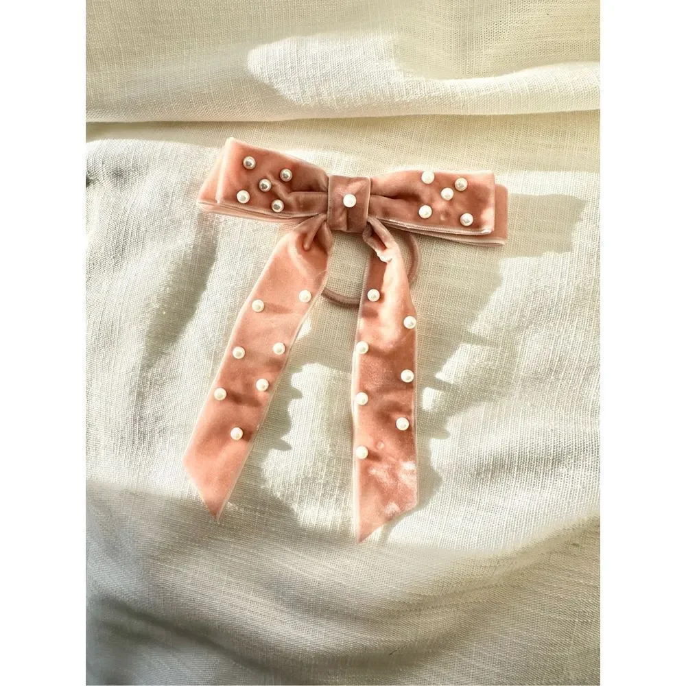 Light pink velvet bow hair tie with pearl embellishment
